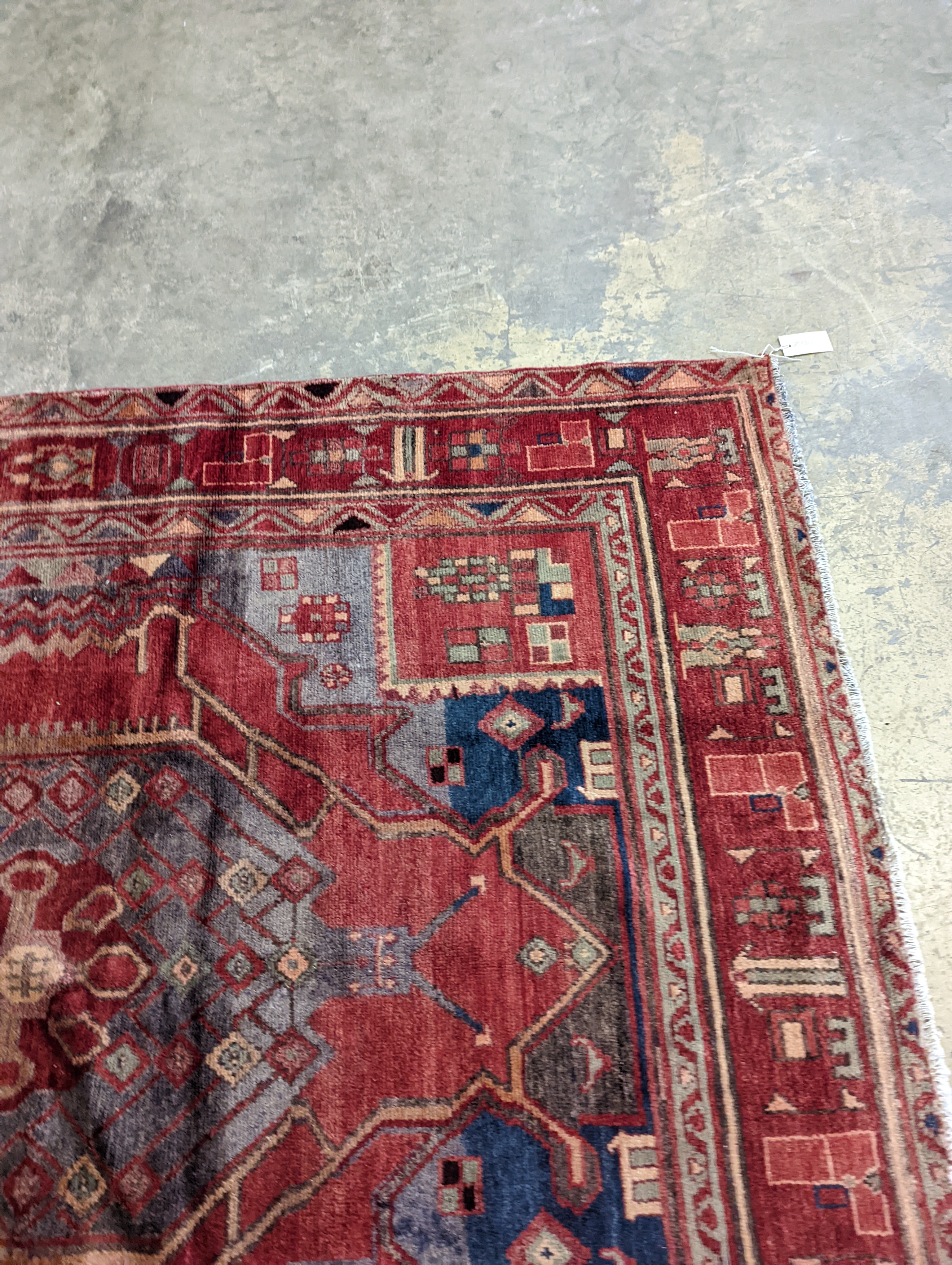 An Ardabil red ground carpet, 322 x 157cm